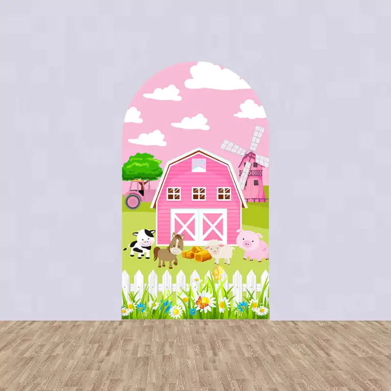 Center arched backdrop with a pink barn, farm animals, and a windmill under a blue sky, perfect for a barnyard birthday celebration.