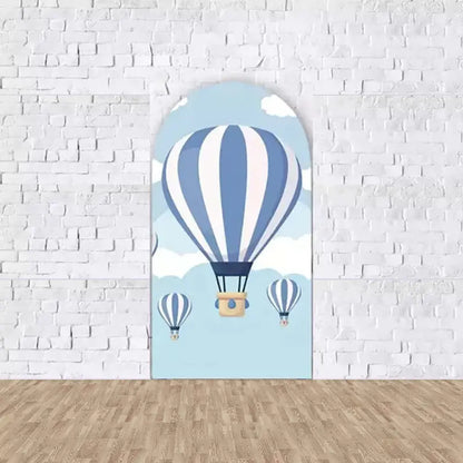 Center arch featuring a large hot air balloon in blue and white above soft clouds—ideal for centerpiece decor in sky or balloon-themed events.