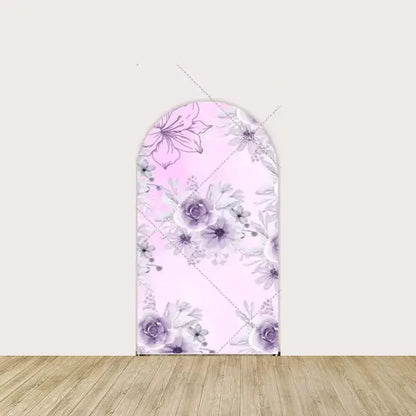 Arch panel with light pink background and soft purple flowers—romantic floral design for Quinceañera party themes or decor.