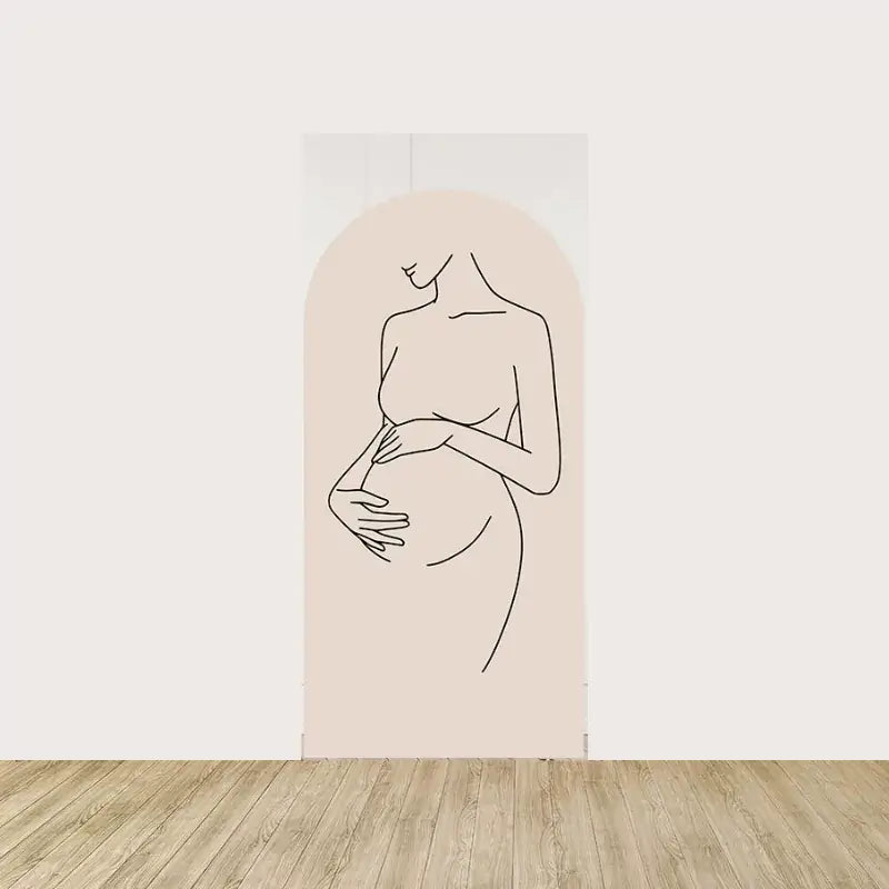 Silhouette of a pregnant woman cradling her belly, representing the beauty and anticipation of motherhood.