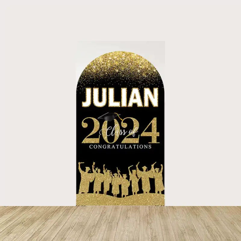 Personalized with “Julian Class of 2024” in bold gold lettering, decorated with a graduation cap and silhouettes of cheering graduates, set against a black background with gold glitter.