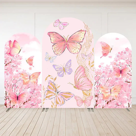 Backdrop with pink and lavender butterflies over floral blossoms, creating an elegant and whimsical decor for events.