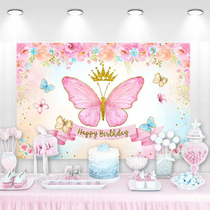 Princess birthday party backdrop featuring a large butterfly, crown, and floral designs for a girl's themed celebration