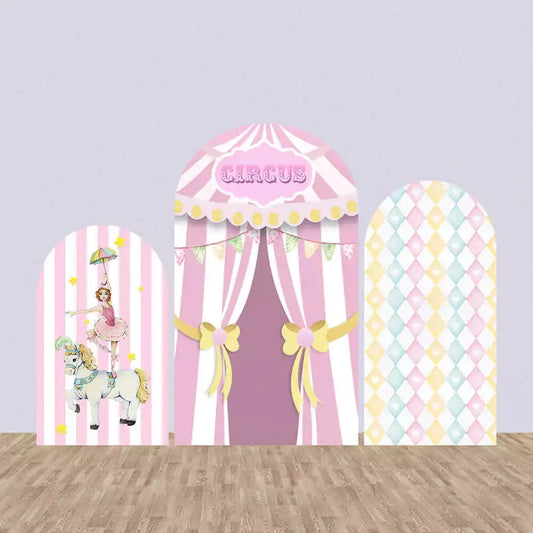 Three-piece arch backdrop set in pink circus theme featuring a tent, acrobatic ballerina on horse, and pastel harlequin pattern—perfect for carnival parties.