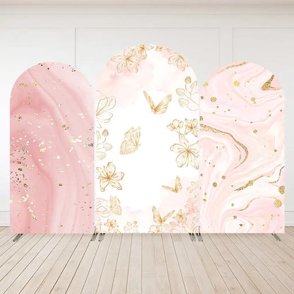 Three-panel arch backdrop set featuring blush pink marble patterns, gold foil butterflies, and floral illustrations—perfect for elegant or feminine celebrations.