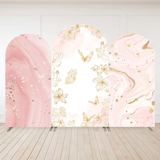 Three-panel arch backdrop set featuring blush pink marble patterns, gold foil butterflies, and floral illustrations—perfect for elegant or feminine celebrations.