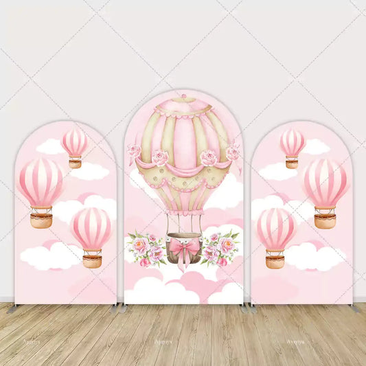 Three-panel pink hot air balloon arch backdrop with clouds, roses, and vintage balloon design—perfect for girl’s baby shower or birthday party.