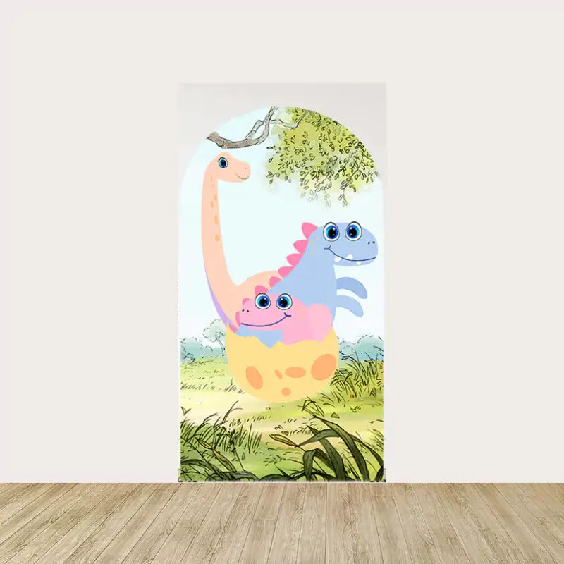 Center backdrop featuring a family of colorful dinosaurs, including a baby dino hatching from an egg, adding a fun and friendly focal point to the setup.