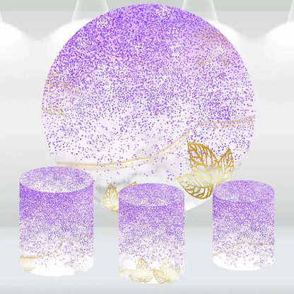 Round backdrop with purple glitter and gold leaf accents, paired with three matching cylindrical covers featuring coordinating glitter and leaf designs.