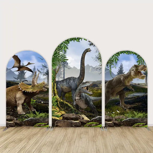 Three-panel arch backdrop featuring lifelike dinosaurs including T-Rex, Brachiosaurus, Triceratops, and flying Pterodactyls in a lush Jurassic forest.