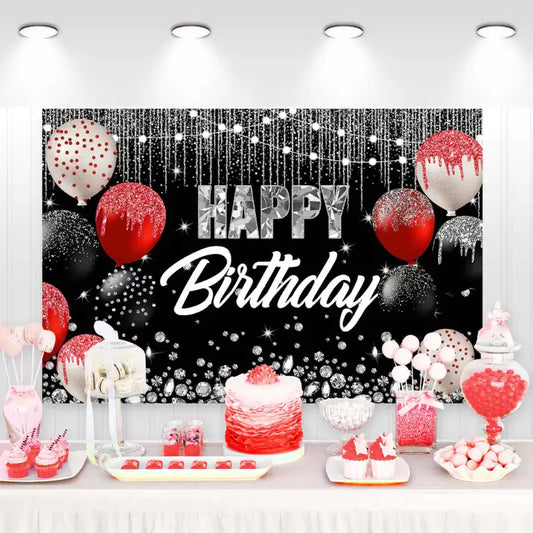 "Happy Birthday" party backdrop featuring red, black, and silver balloons with glitter accents.