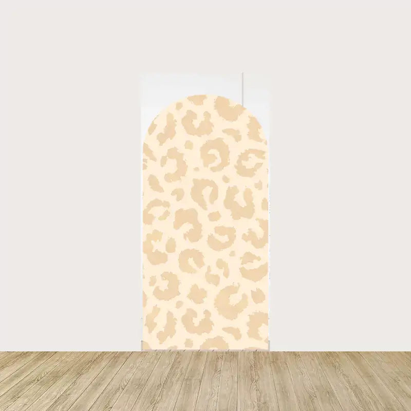 Arch panel featuring a neutral beige leopard print—great for modern or gender-neutral safari-themed parties.