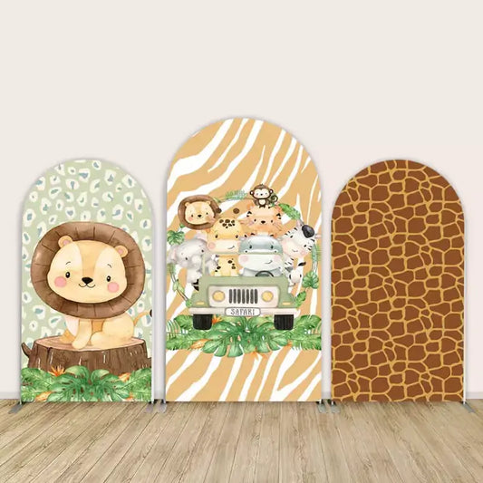 Three-panel safari arch backdrop showing cartoon jungle animals riding in a jeep on a zebra-stripe center, a cute lion on leopard-print left, and a giraffe-pattern right arch.