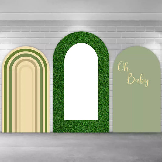Three-panel baby shower arch backdrop set with beige and green rainbow arch, faux grass frame center panel, and sage green “Oh Baby” arch.