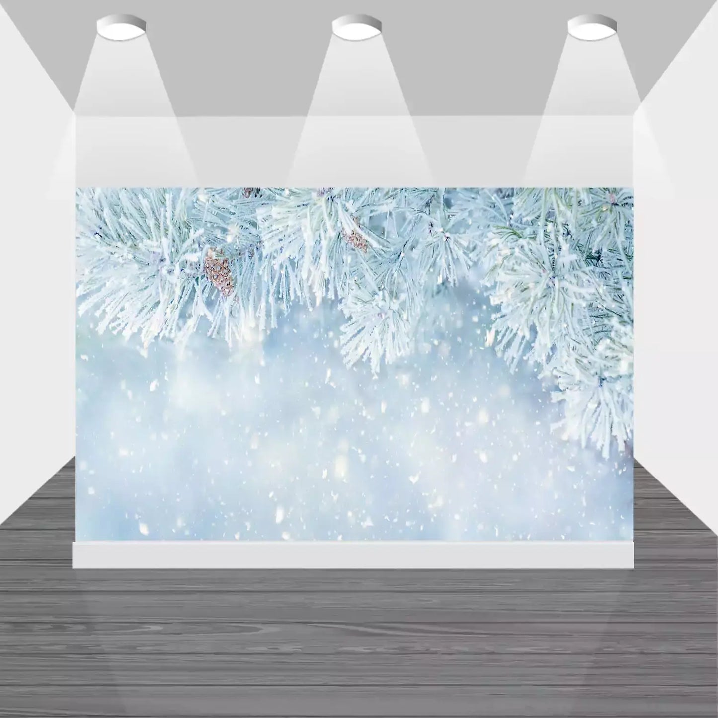 Winter-themed photo backdrop with detailed pine branches covered in frost and snowflakes gently falling.