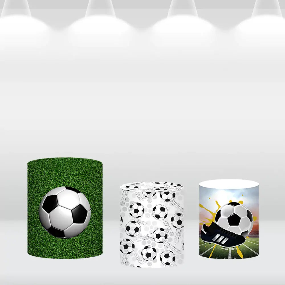 Set of three soccer-themed cylinder covers, including a grass background with a soccer ball, a pattern of soccer balls on a white background, and a soccer ball with cleats on a field design.