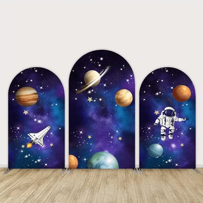 Three-panel space-themed arch backdrop featuring planets, stars, an astronaut, and a rocket against a purple-blue galaxy background—perfect for kids’ space parties.