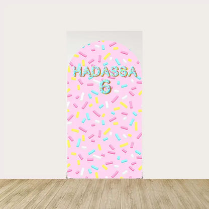 Center arch with “HADASSA 6” text in colorful letters surrounded by sprinkles—perfect for a sweet celebration or birthday decor.