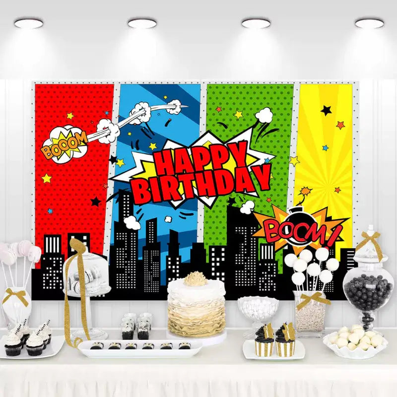 Dynamic superhero-themed birthday party backdrop featuring comic style 'Boom' and 'Pow' expressions with a cityscape silhouette.