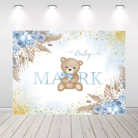 Cute blue floral baby shower backdrop featuring a teddy bear for baby boy events.