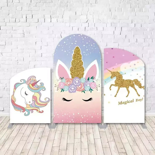 Three-panel unicorn party arch backdrop with pastel rainbow tones, gold glitter unicorn horn and silhouette, floral crown, and the words “Magical Day.”