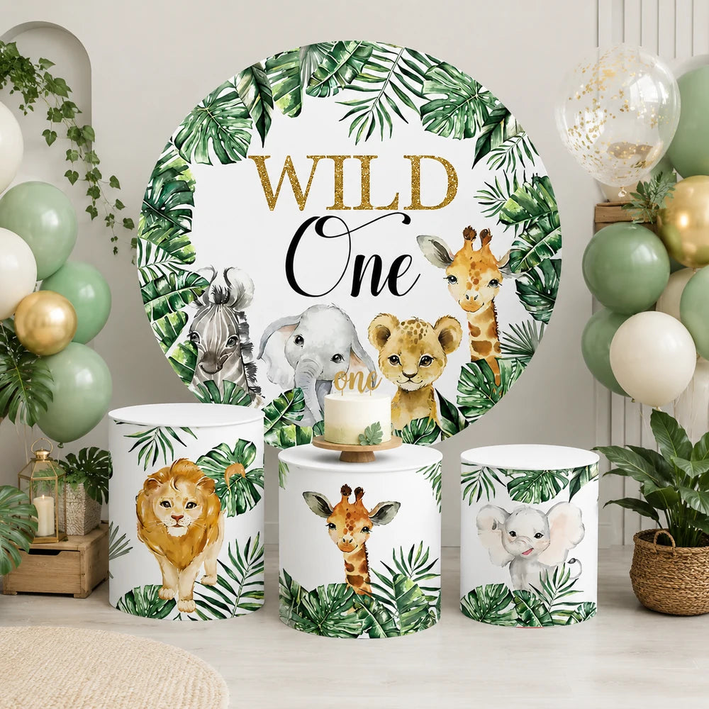 Wild One safari party backdrop set with one round jungle animals backdrop and three matching cylinder covers featuring lion, giraffe and elephant designs.