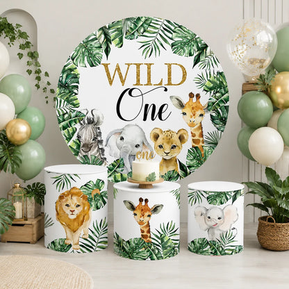 Wild One safari party backdrop set with one round jungle animals backdrop and three matching cylinder covers featuring lion, giraffe and elephant designs.