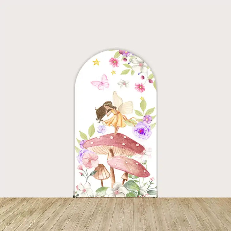 Fairy-themed backdrop with a fairy on a pink mushroom, surrounded by flowers and butterflies, adding a charming woodland vibe to any event.
